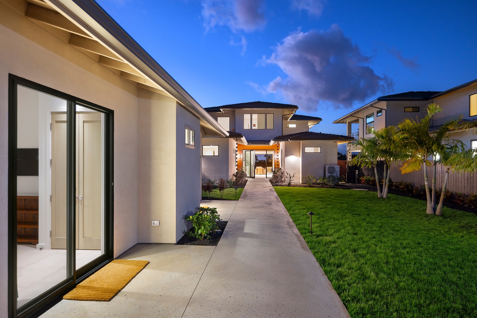 Kamuela Vacation Rentals, 6BD Mauna Lani Lux Golf Estate (5) at One Ocean - The main entry pathway offers a warm welcome, with the detached Ohana suites nestled alongside.