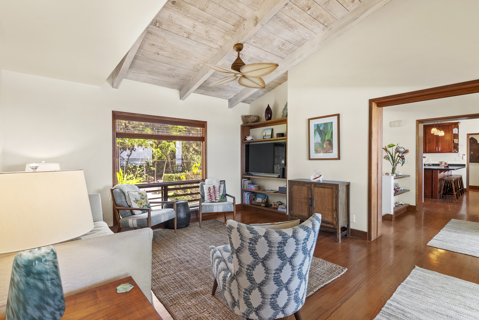 Haleiwa Vacation Rentals, Maluhia Beach House - An inviting living space with high ceilings and comfortable seating, perfect for unwinding.