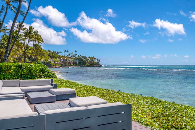 Honolulu Vacation Rentals, Diamond Head Beachfront Estate - Oceanfront dining terrace with panoramic coastal views—your front-row seat to Diamond Head’s beauty.