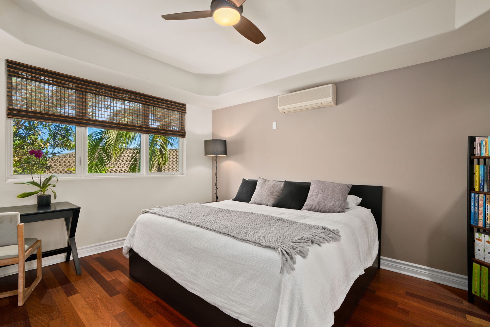 Princeville Vacation Rentals, Kaiulani #8 - Answer a few emails at the window desk, bamboo shades softening the light.