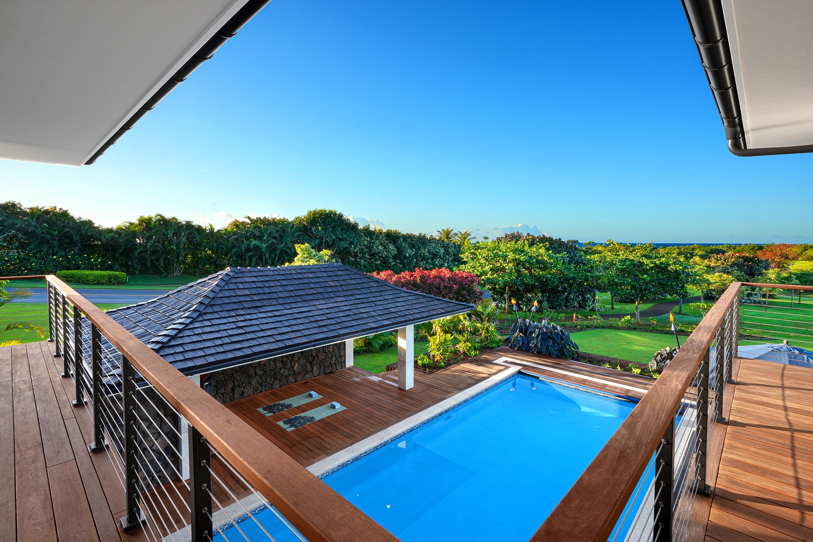 Koloa Vacation Rentals, Hale Kai‘opua at Kukui'ula - Savor breathtaking sunset dinners on the outdoor dining lanai with ample seating.