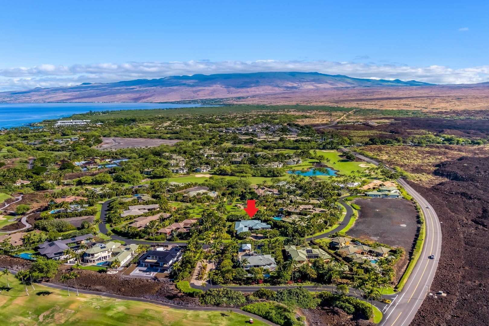 Kamuela Vacation Rentals, Champion Ridge Elegance - Elevated aerial view revealing the estate’s proximity to stunning open landscapes.