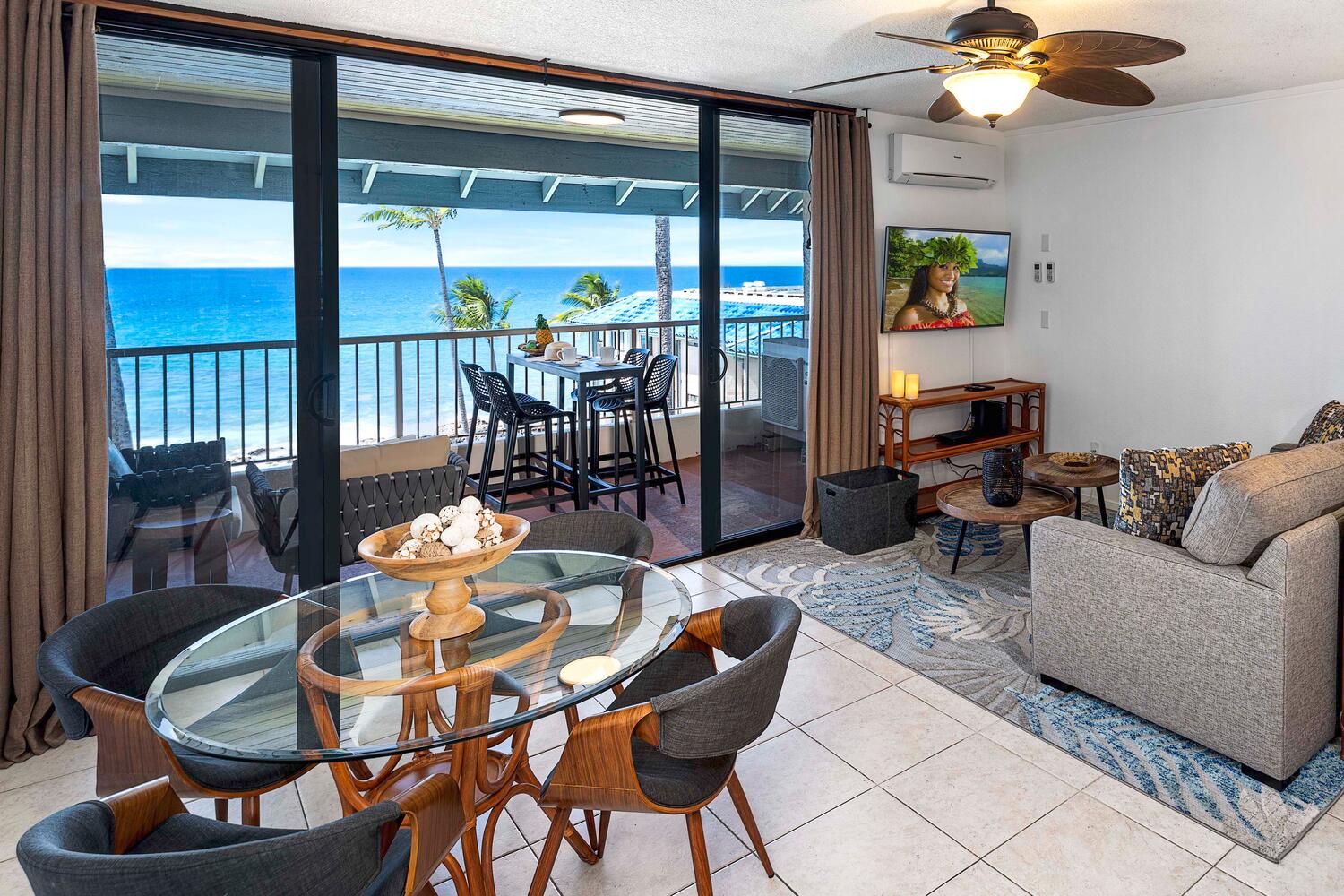 Kailua Kona Vacation Rentals, Kona Reef F23 - A cozy living space with AC, fan and natural lighting.