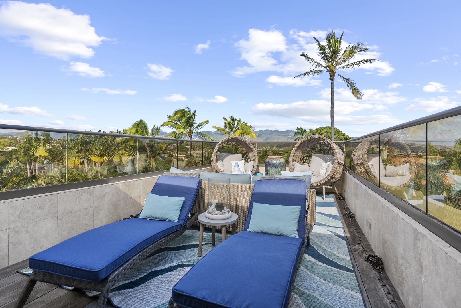 Honolulu Vacation Rentals, Pili Pono - Rooftop terrace with two lounge chairs and stunning views.