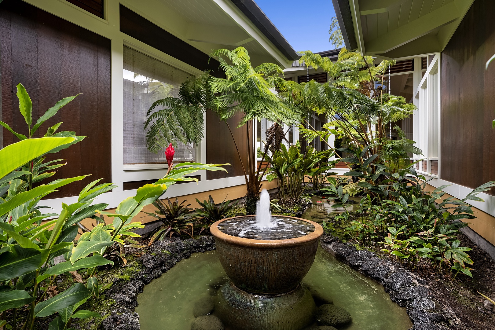 Kailua Kona Vacation Rentals, Pineapple House - Water Feature with tropical plants and flowers