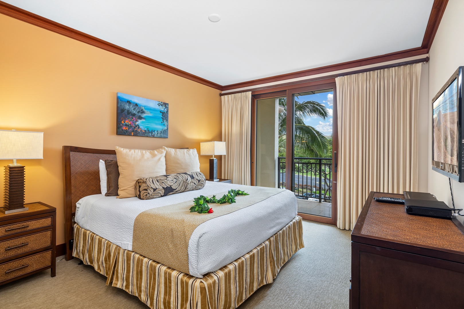 Kapolei Vacation Rentals, Ko Olina Beach Villas O402 - The primary guest bedroom with a private lanai.