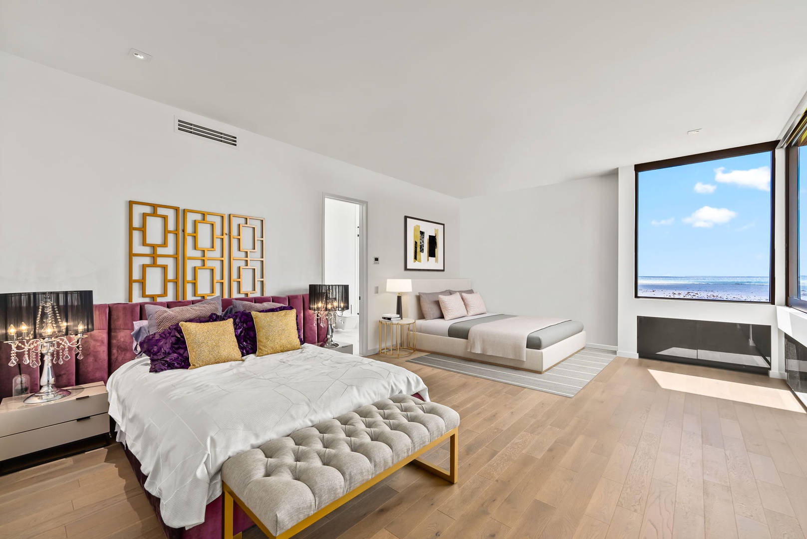 Honolulu Vacation Rentals, Ocean Villa Emilie - Designed with subtle gold accents and plush textures, this guest suite is perfect for rest and rejuvenation after a day of island discovery.