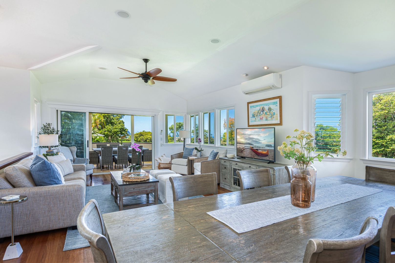 Princeville Vacation Rentals, Ohana Kamalani - Dining area with seating for eight and natural light pouring in, perfect for shared meals with loved ones.