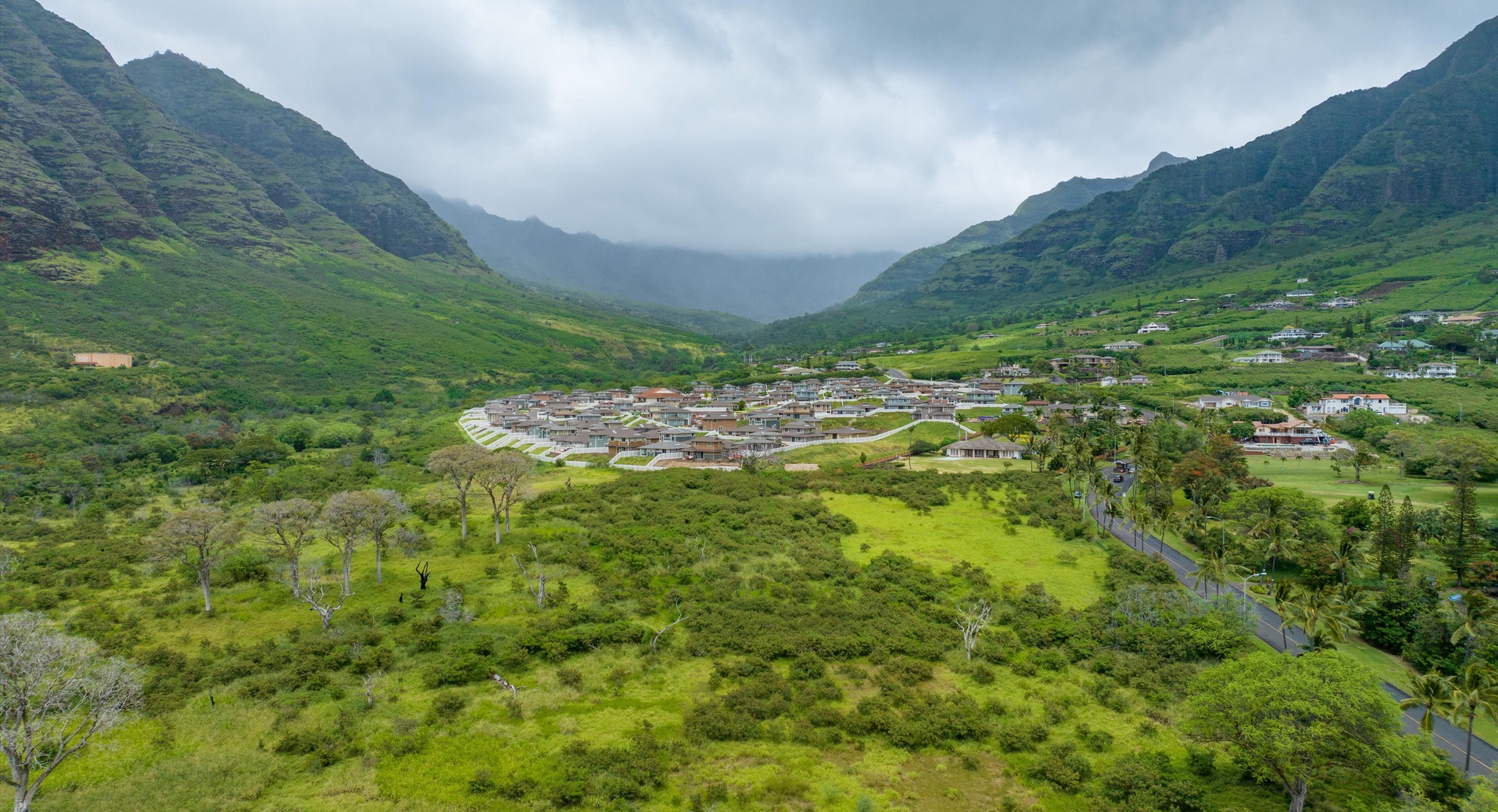 Makaha Valley Vacation Rentals, Makaha Valley Hale Kai** - Sweeping drone view capturing the lush green beauty of M?kaha Valley.