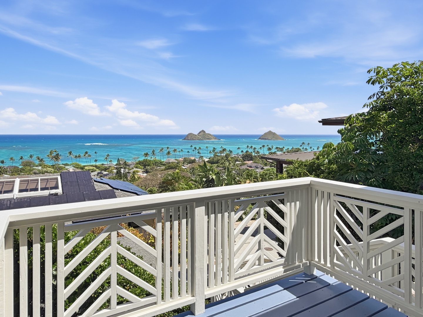 Kailua Vacation Rentals, Kai Nalu - Unforgettable ocean panorama vies showcase crystal-clear turquoise waters, tropical islands, and palm-lined coastline from this elevated property location.