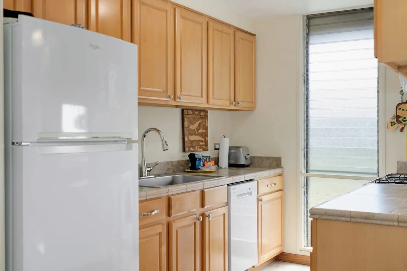 Kihei Vacation Rentals, Kalama Terrace P302 - Stock up for the week; the full-size fridge and open counters have the room for it.