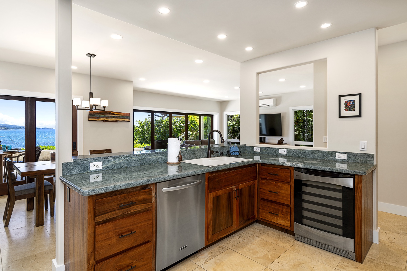 Kailua Kona Vacation Rentals, Ali'i Point #7 - The large gourmet kitchen has been completely upgraded with granite countertops, Koa cabinets, and new stainless-steel appliances
