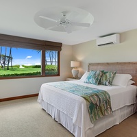 Kailua Vacation Rentals, Kailua Shores Estate 5 Bedroom - Beach house spacious guest bedroom with a king-size bed, cozy seating, and garden vistas.