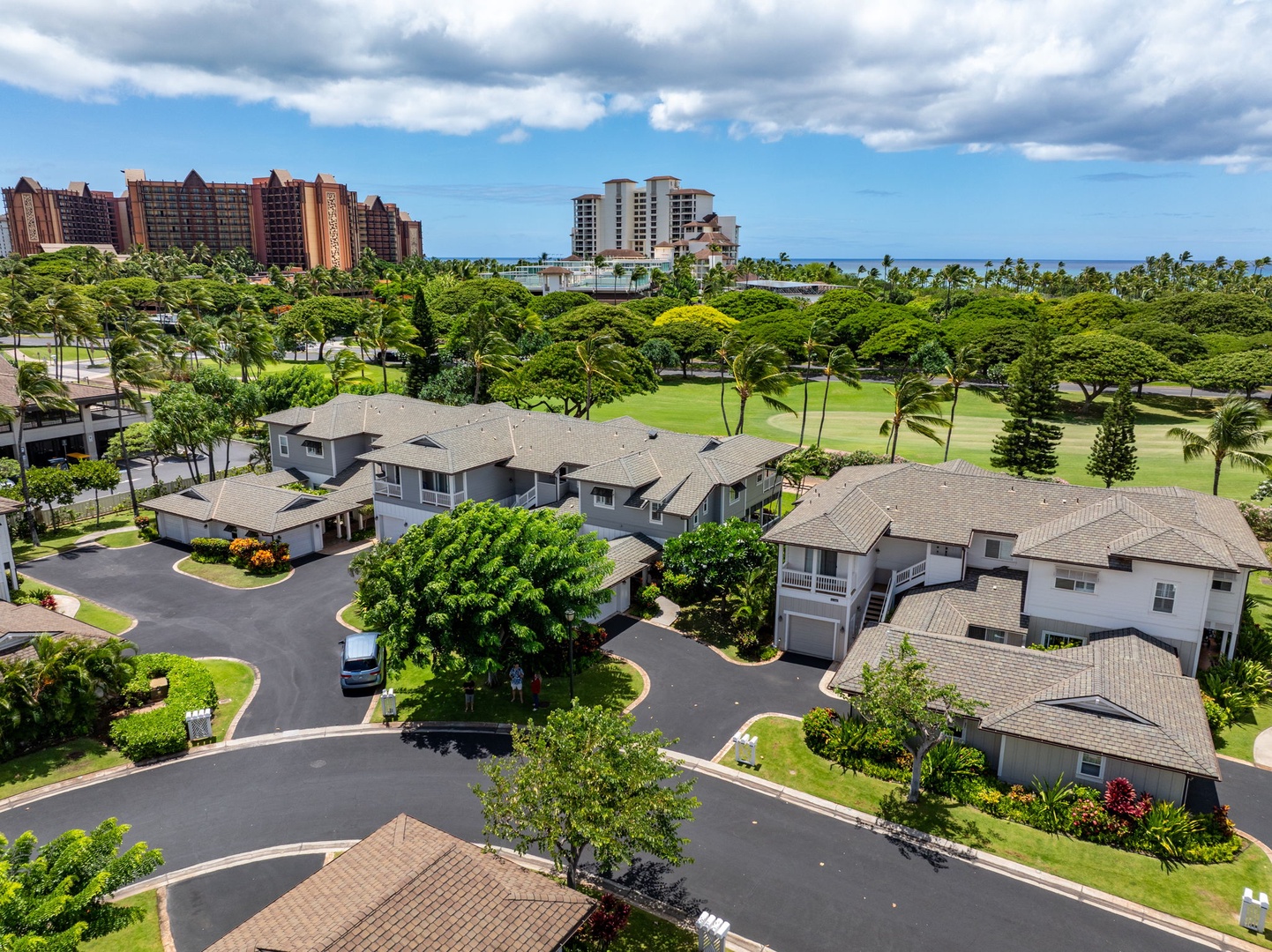 Kapolei Vacation Rentals, Coconut Plantation 1080-4 - From high above, the coastline and open ocean stretch past the resort.