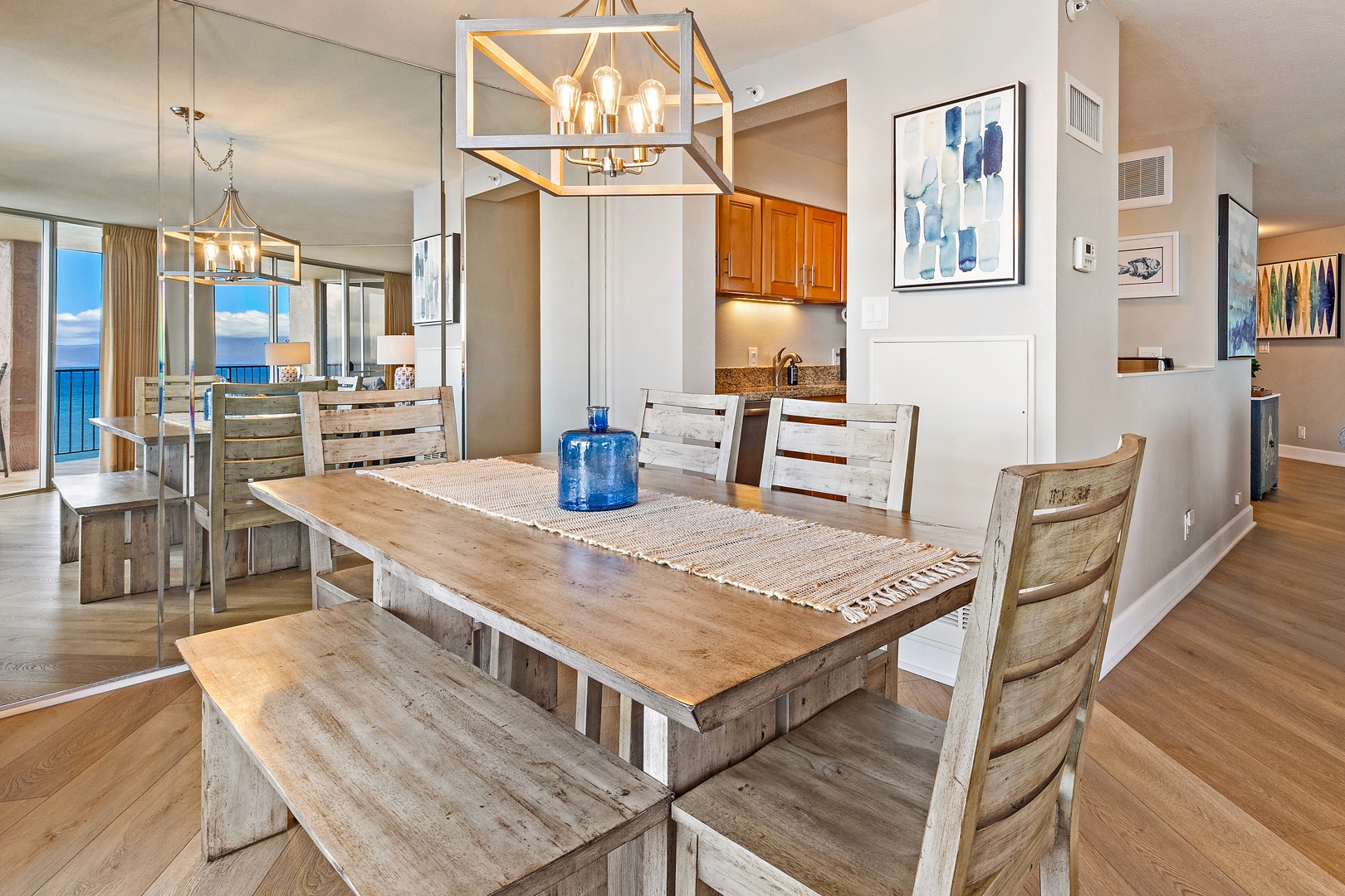 Lahaina Vacation Rentals, Royal Kahana 1010 - Gather around the rustic dining table, offering plenty of seating for family meals or casual dining with friends.