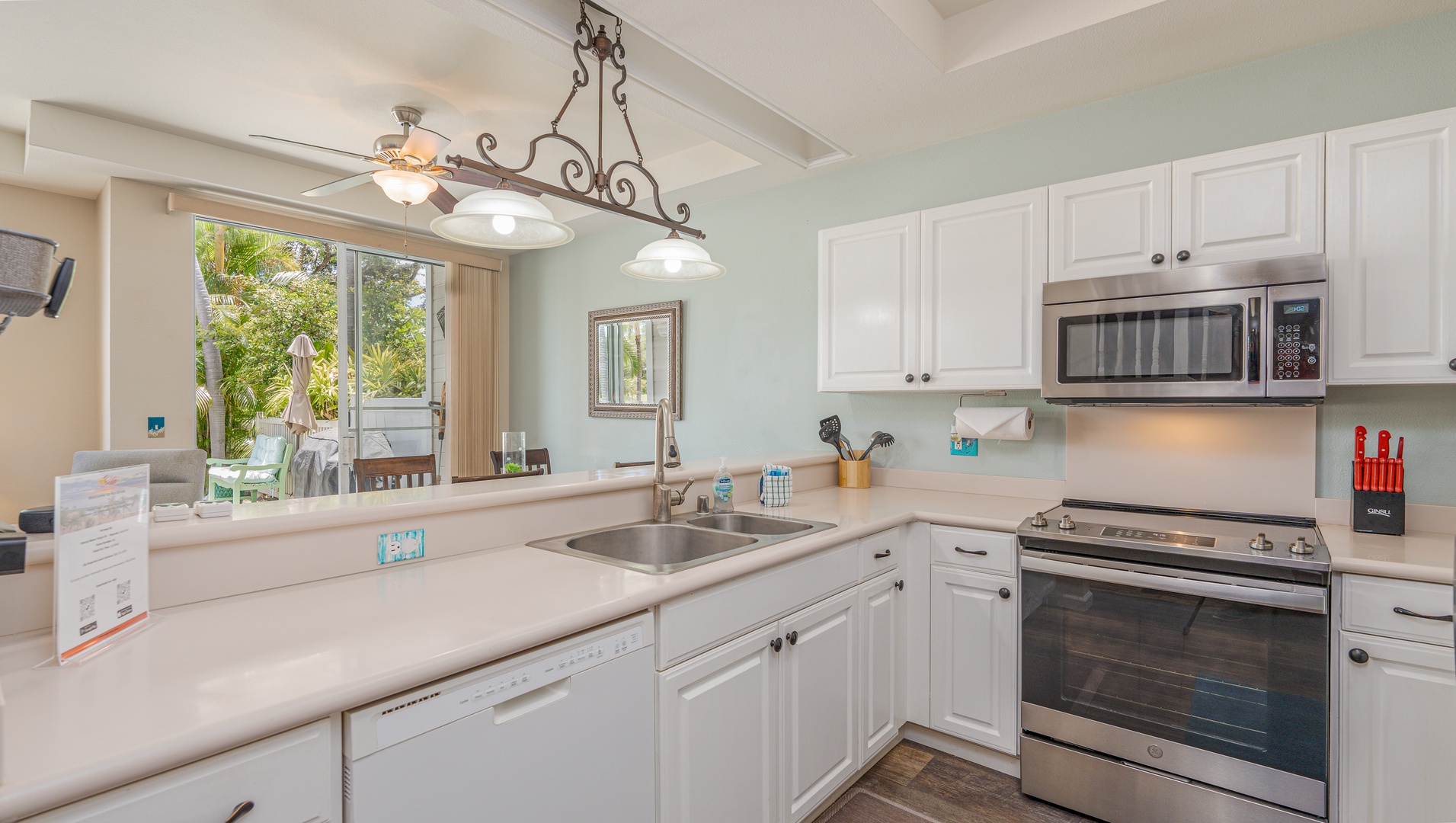 Kapolei Vacation Rentals, Fairways at Ko Olina 8G - Your fully equipped kitchen awaits with modern appliances, ample counter space, and a bright atmosphere perfect for preparing meals during your stay.