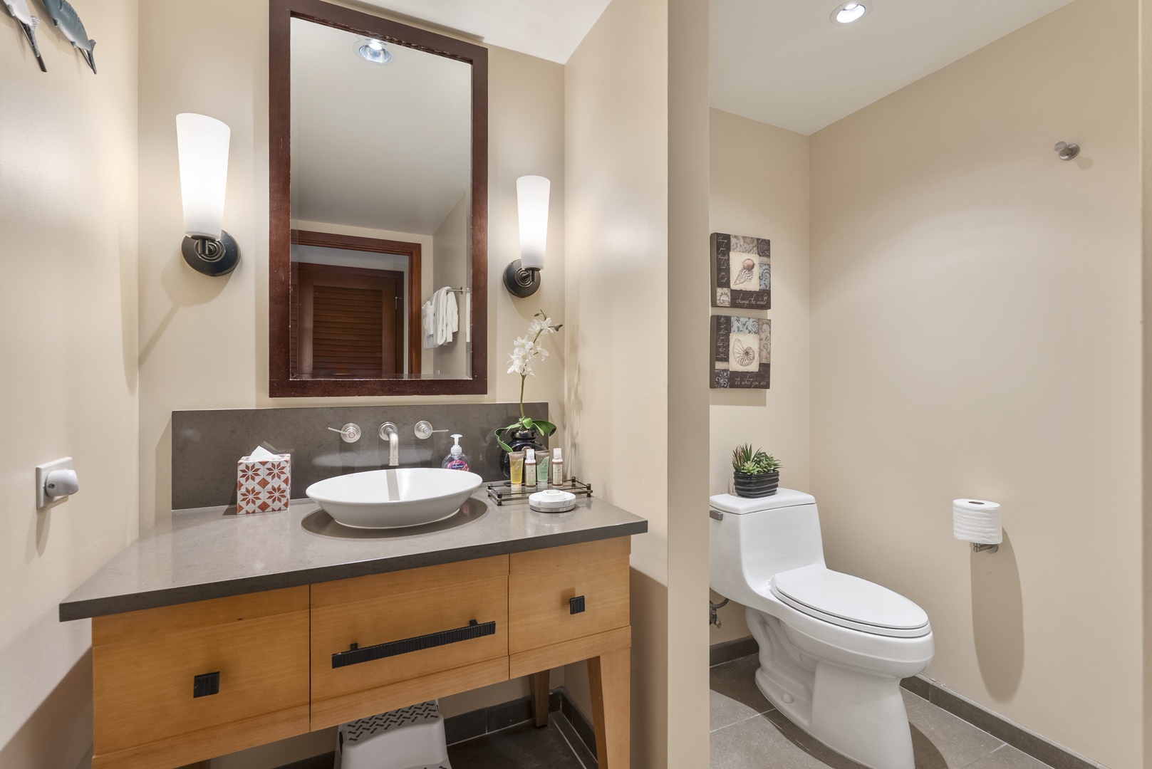 Kapolei Vacation Rentals, Ko Olina Beach Villas O1404 - Sconces light the guest vanity, ready for the pre-dinner scramble.