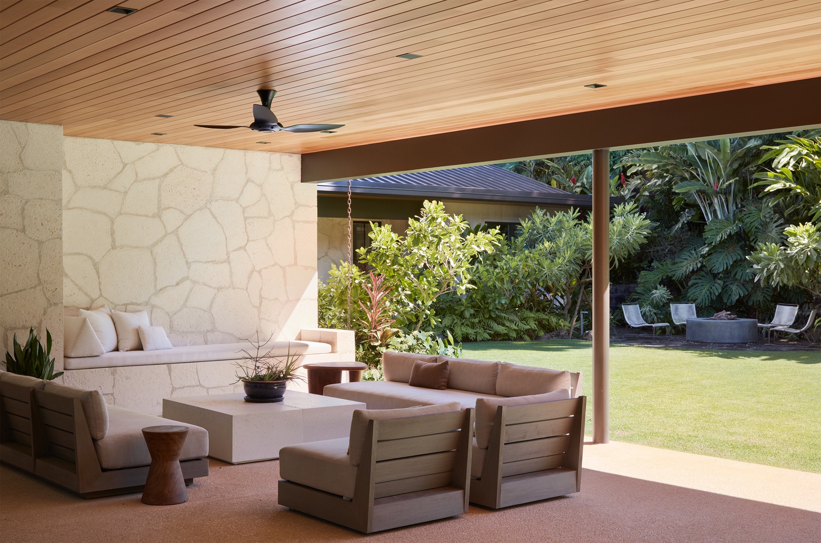 Honolulu Vacation Rentals, Diamond Head Hillside Estate** - Designed for effortless indoor-outdoor living, this covered gathering space offers a comfortable place to enjoy morning coffee, evening cocktails, and time together.