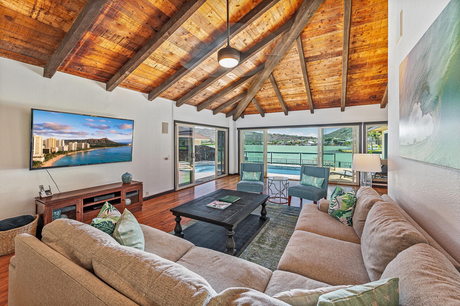 Honolulu Vacation Rentals, Nani Wai - Main living room with pool and stunning marina views.
