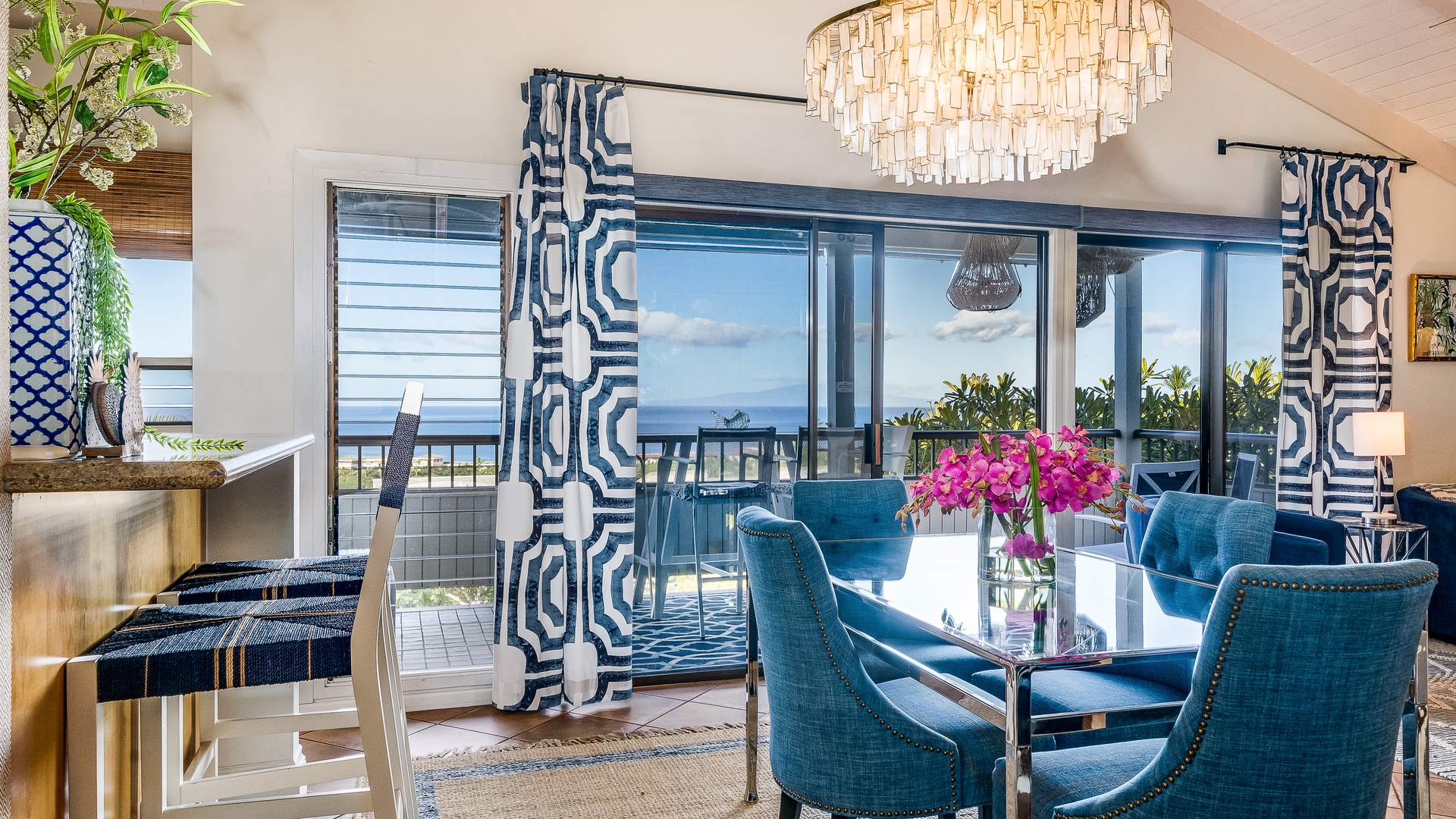 Kihei Vacation Rentals, Wailea Ekolu 1106 - A bright dining area with large windows and ocean views, perfect for enjoying meals with a view.