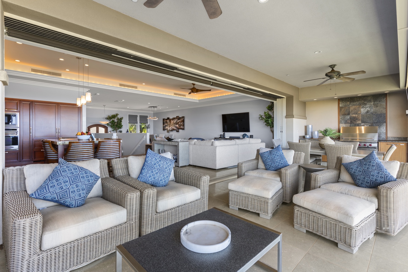 Wailea Vacation Rentals, Wailea Luxury Residence Hoolei 23-3 - The spacious lanai seamlessly connects to the indoor living area, offering a perfect blend of outdoor relaxation and indoor comfort.