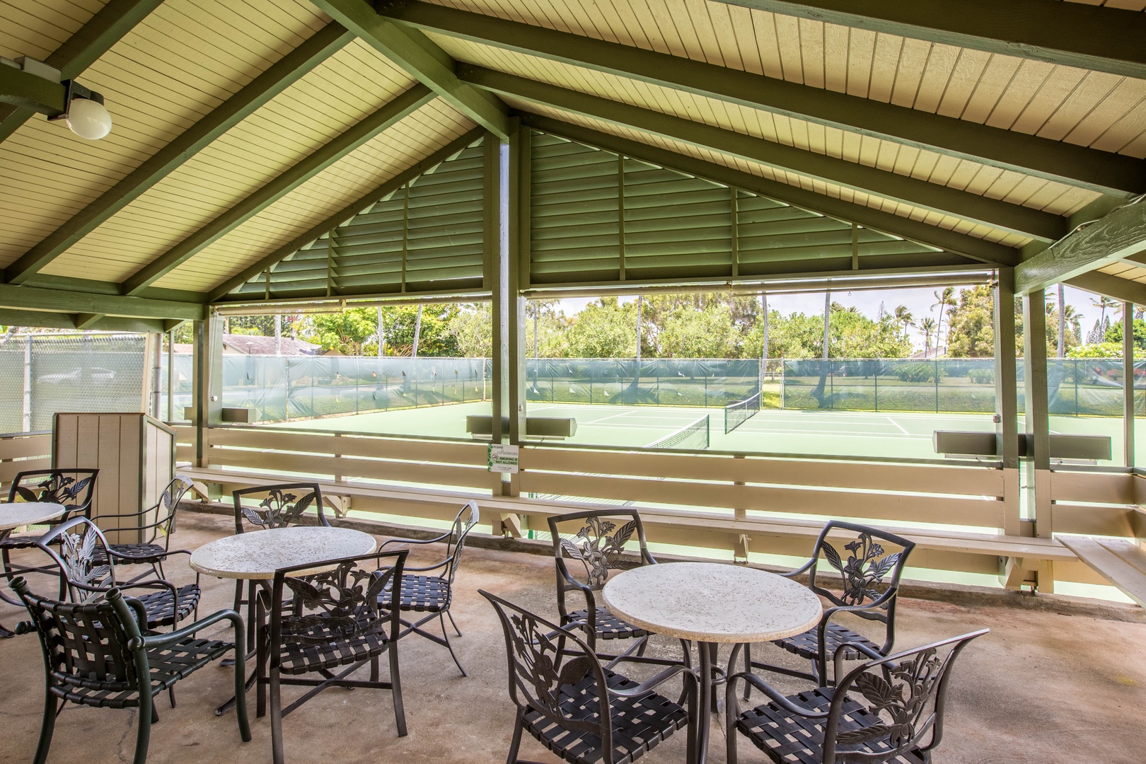 Kahuku Vacation Rentals, Kuilima Estates West #132 - Covered pavilion with seating beside tennis courts.