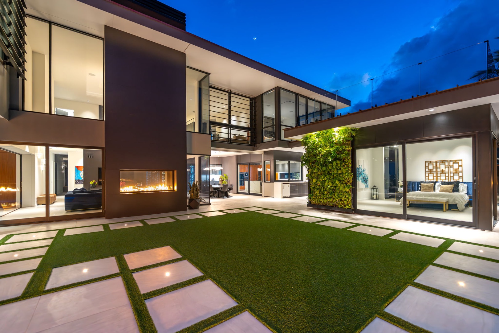 Honolulu Vacation Rentals, Ocean Villa Emilie - A view of the villa’s architectural brilliance from the backyard—where modern design meets tropical serenity.