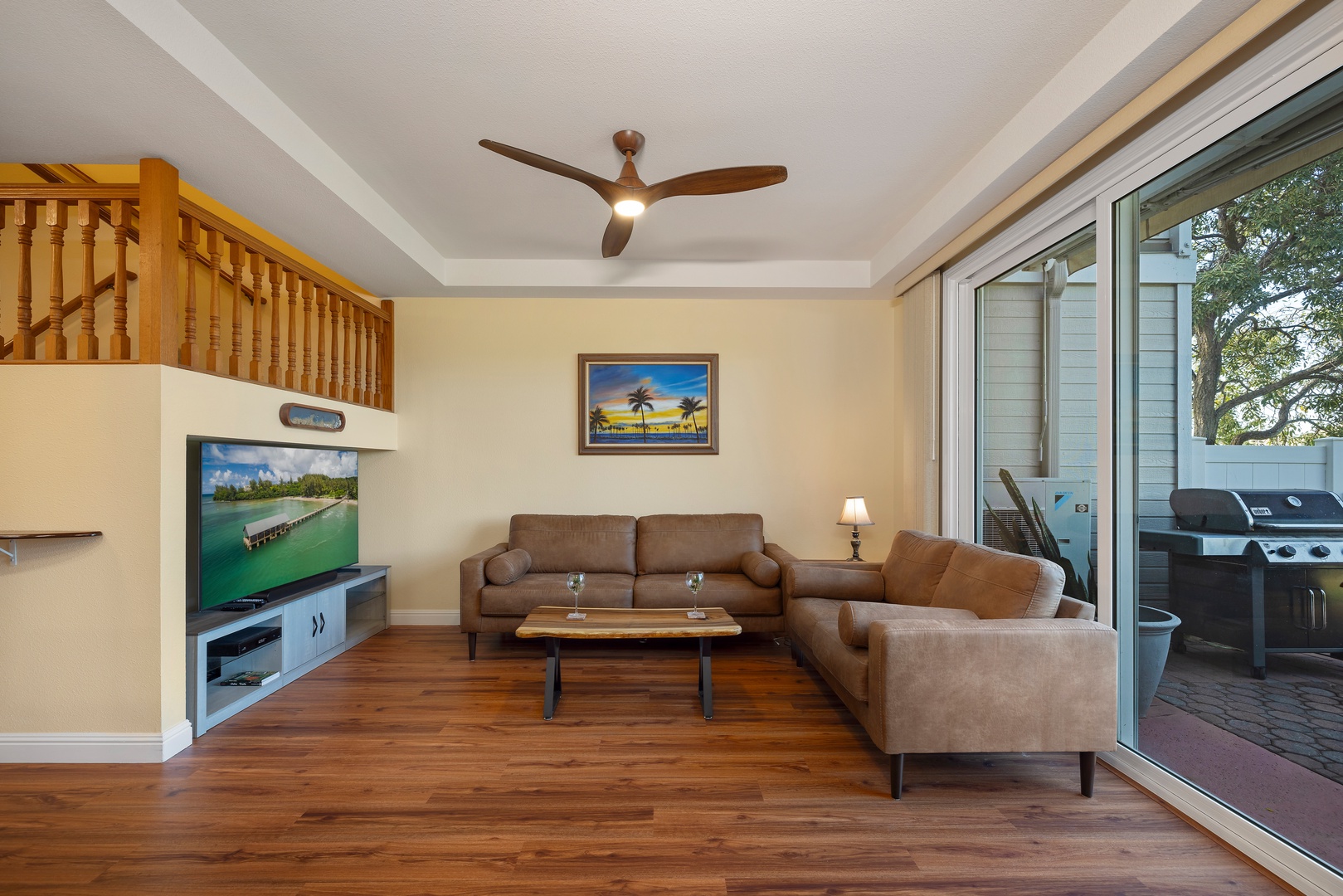 Kapolei Vacation Rentals, Fairways at Ko Olina 24H - The living room opens to the patio, bringing in natural light and fresh air.