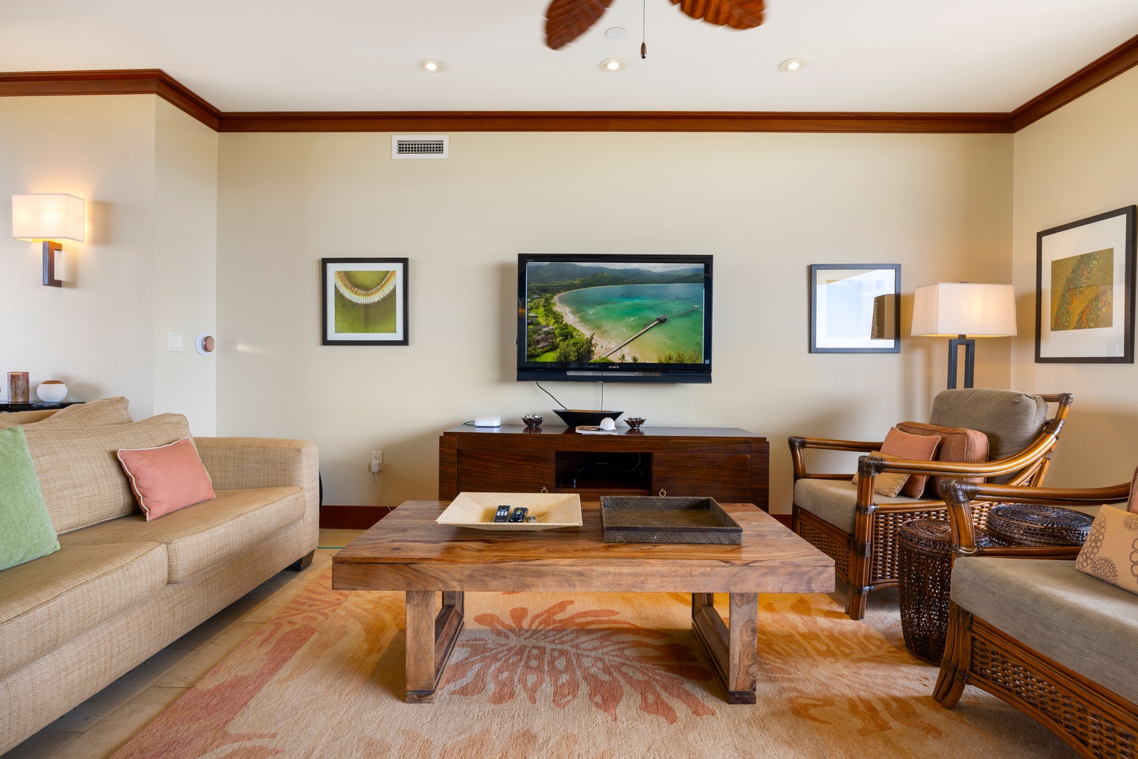 Kapolei Vacation Rentals, Ko Olina Beach Villas O1111 - Unwind in this elegantly appointed living room where tropical vibes meet modern comfort, complete with plush seating and entertainment.