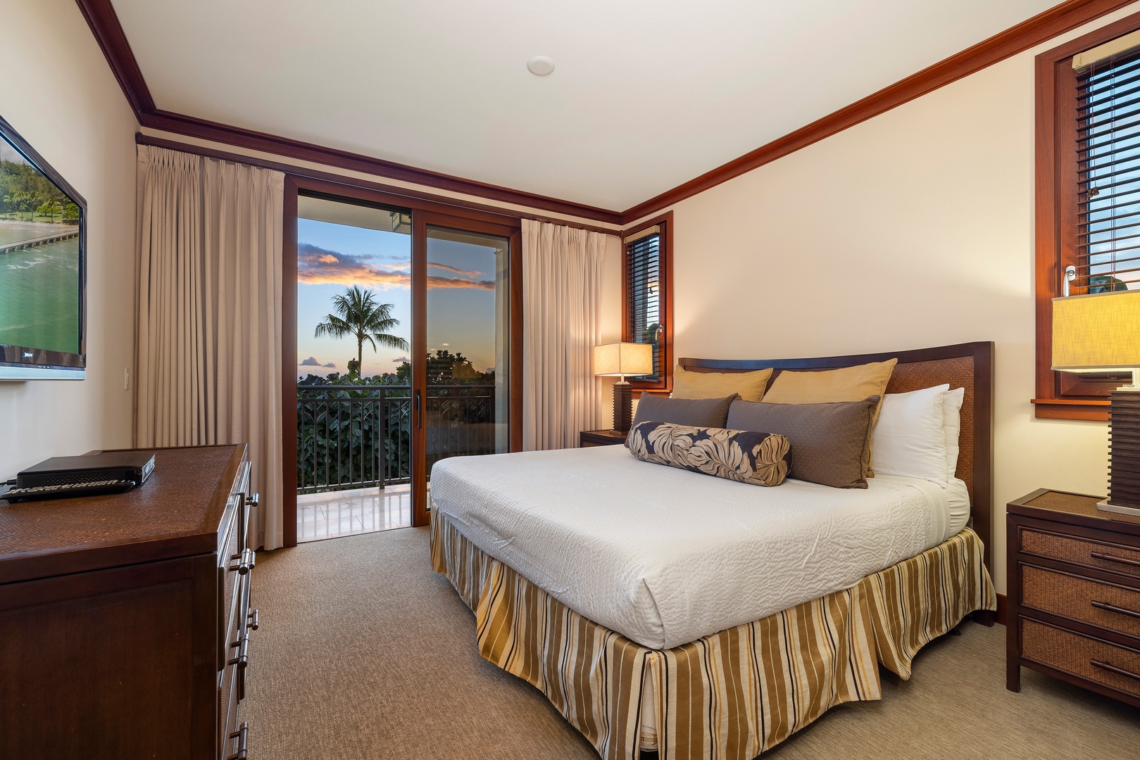 Kapolei Vacation Rentals, Ko Olina Beach Villas B210 - Primary suite with king bed and private lanai access.