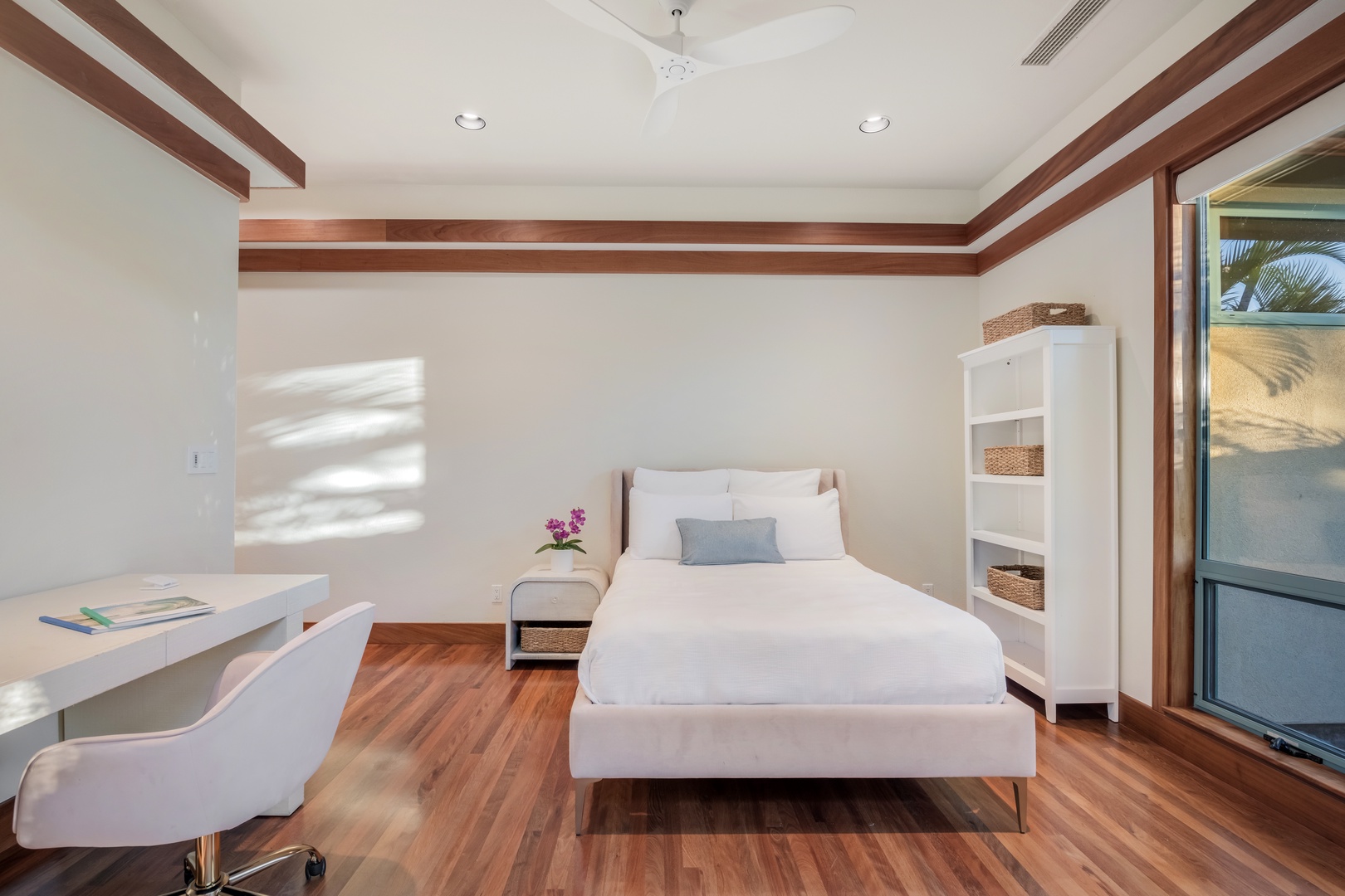 Kamuela Vacation Rentals, Champion Ridge Elegance - Guest Suite 3 with a double bed and personal work space.