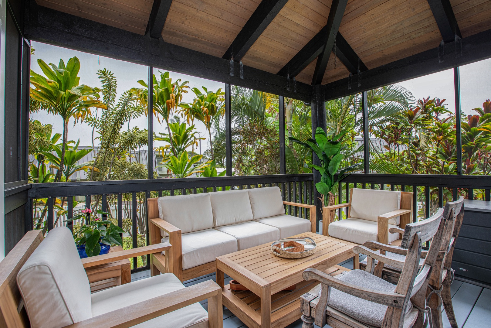Princeville Vacation Rentals, Mauna Kai 11 - Gather for open-air cocktails on the private lanai, surrounded by lush island greenery.