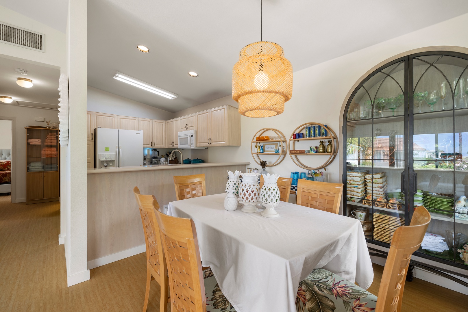 Your bright dining space flows into a fully equipped kitchen, creating the perfect setting for memorable meals together.