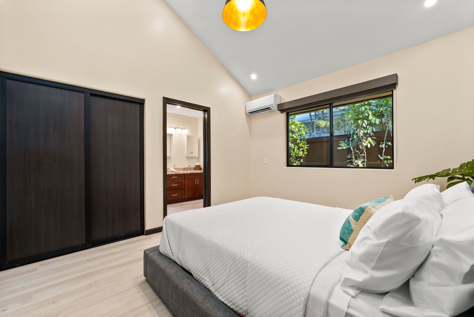 Honolulu Vacation Rentals, Kahala Zen - Comfortable guest bedroom with a queen-size bed and serene atmosphere.