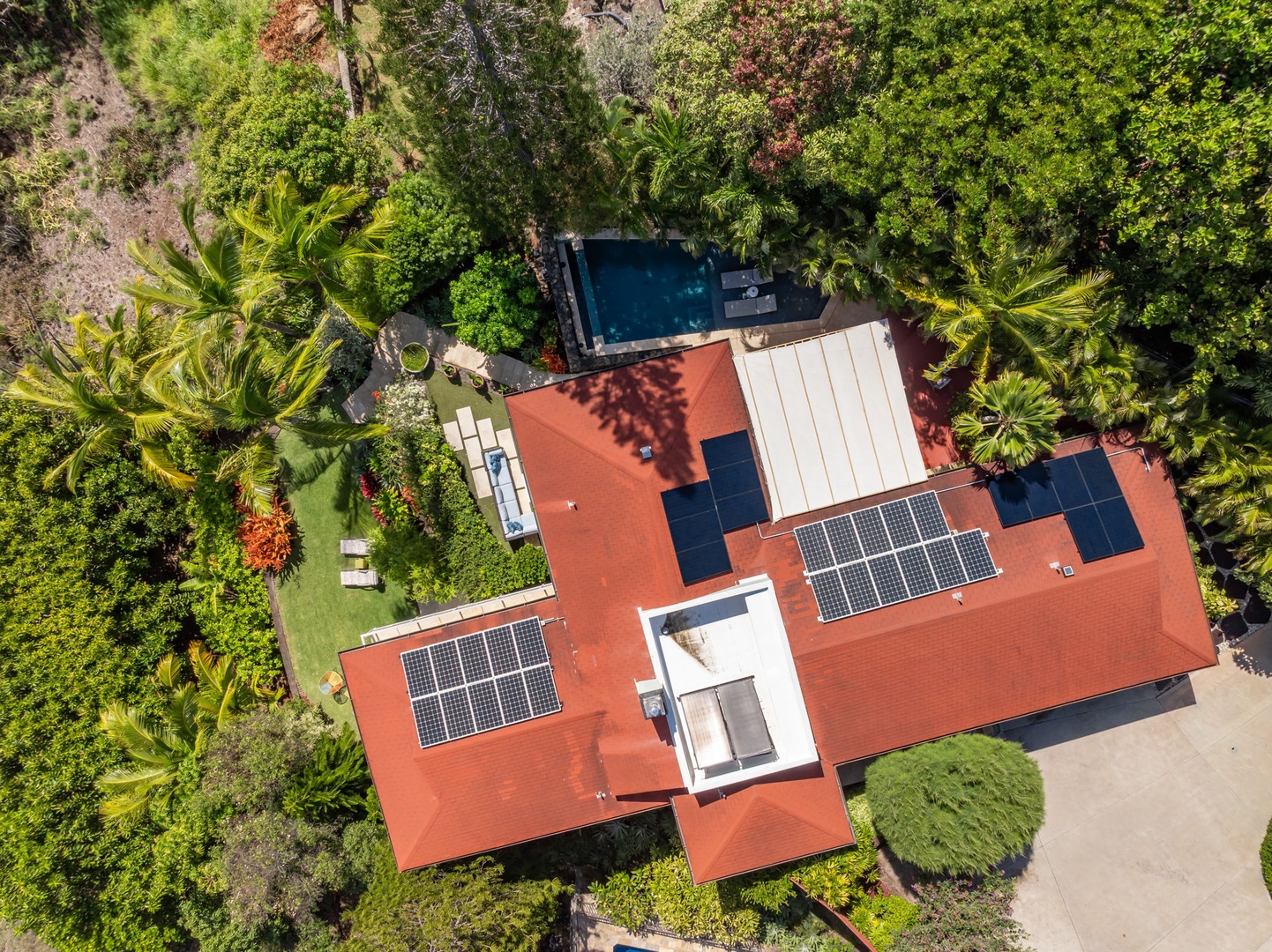 Honolulu Vacation Rentals, Kahala Hills Estate - Bird’s-eye view reveals solar panels, multiple lanais, and terraced garden design.