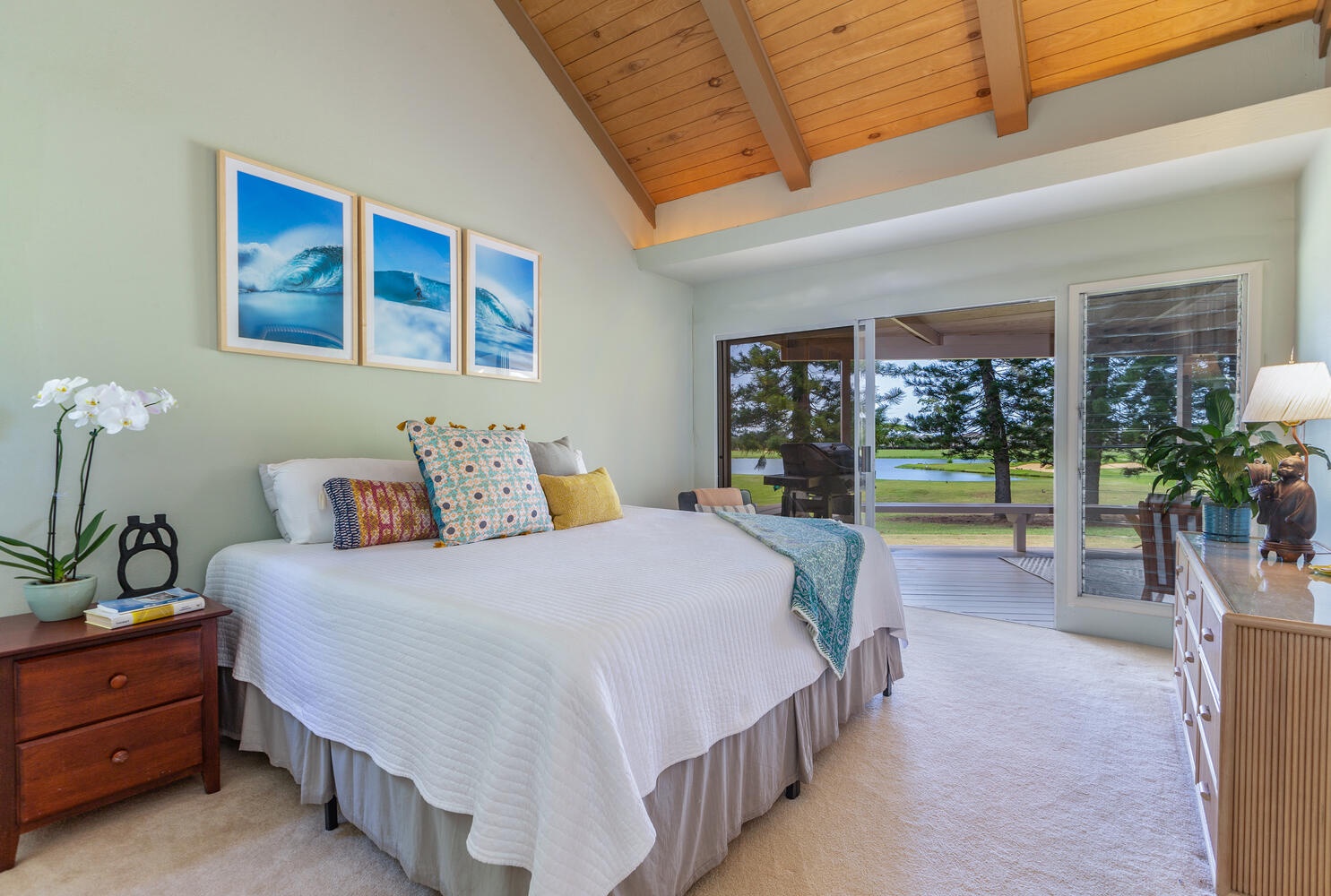 Princeville Vacation Rentals, Wai Puna - Guest bedroom 2 with king, golf views, lanai access, ensuite bathroom