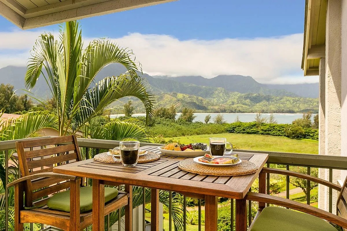 Princeville Vacation Rentals, Hanalei Bay Resort 4301/2 - Enjoy al-fresco dining on the lanai with scenic Hanalei Bay and mountain views.