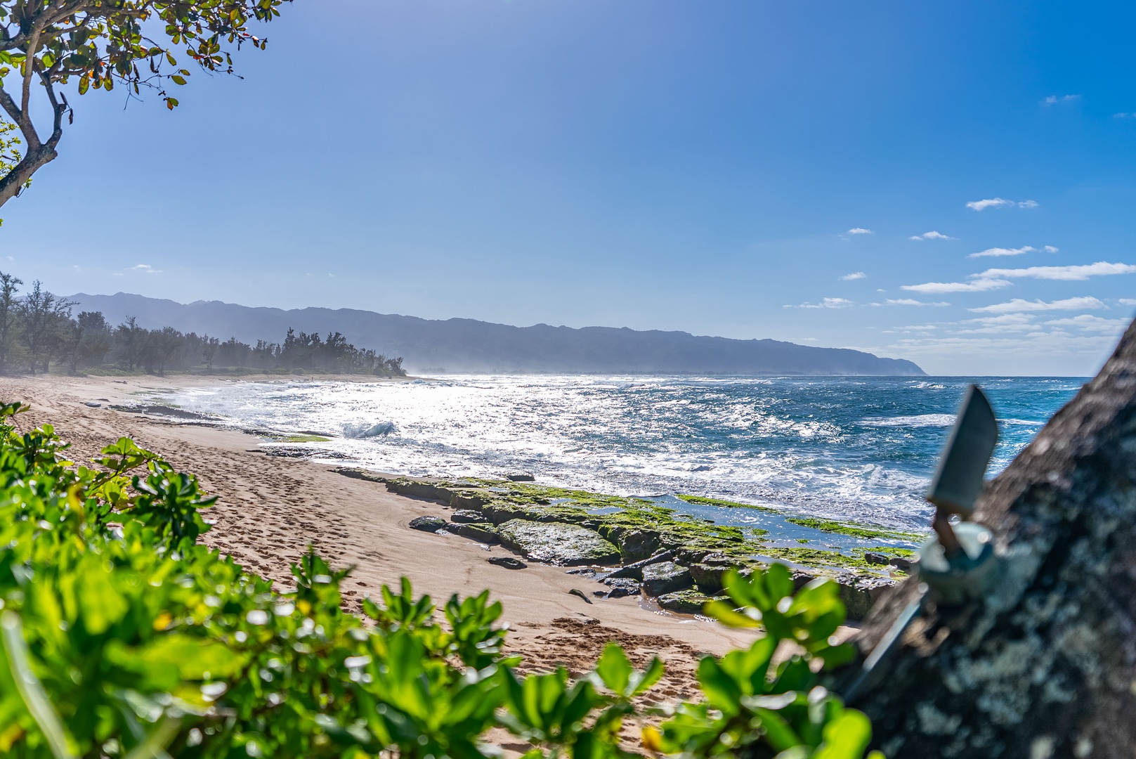 Haleiwa Vacation Rentals, Maluhia Beach House - Wake up to endless ocean views and the soothing sound of waves crashing on the shore.