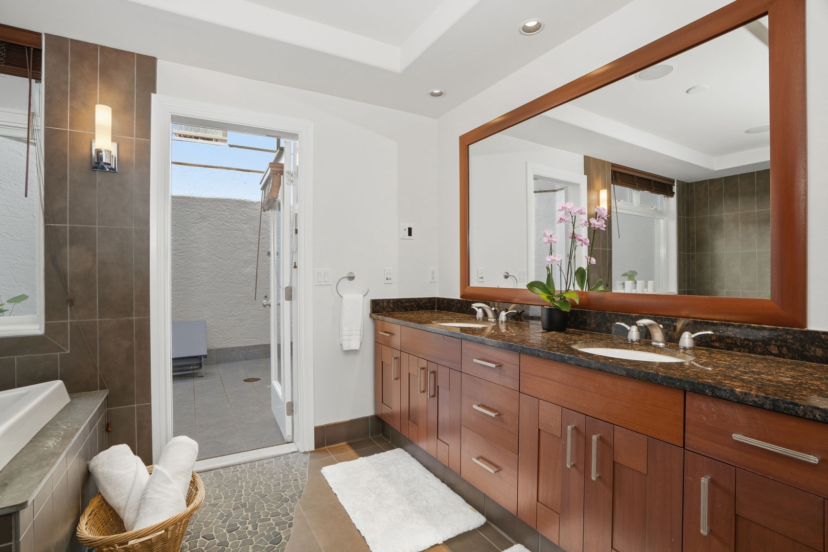 Princeville Vacation Rentals, Kaiulani #8 - A long vanity with plenty of counter, so getting ready for dinner never turns into a negotiation.