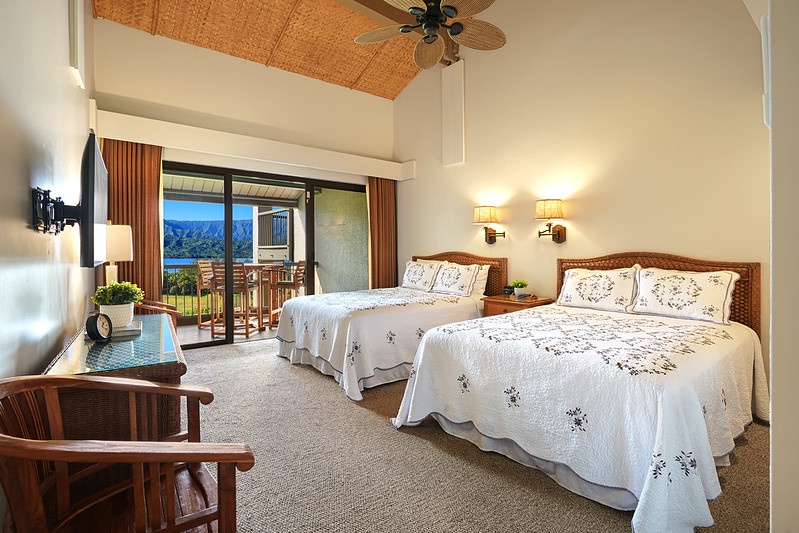 Princeville Vacation Rentals, Hanalei Bay Resort 4303 - Bedroom has two queen beds, TV and private lanai.