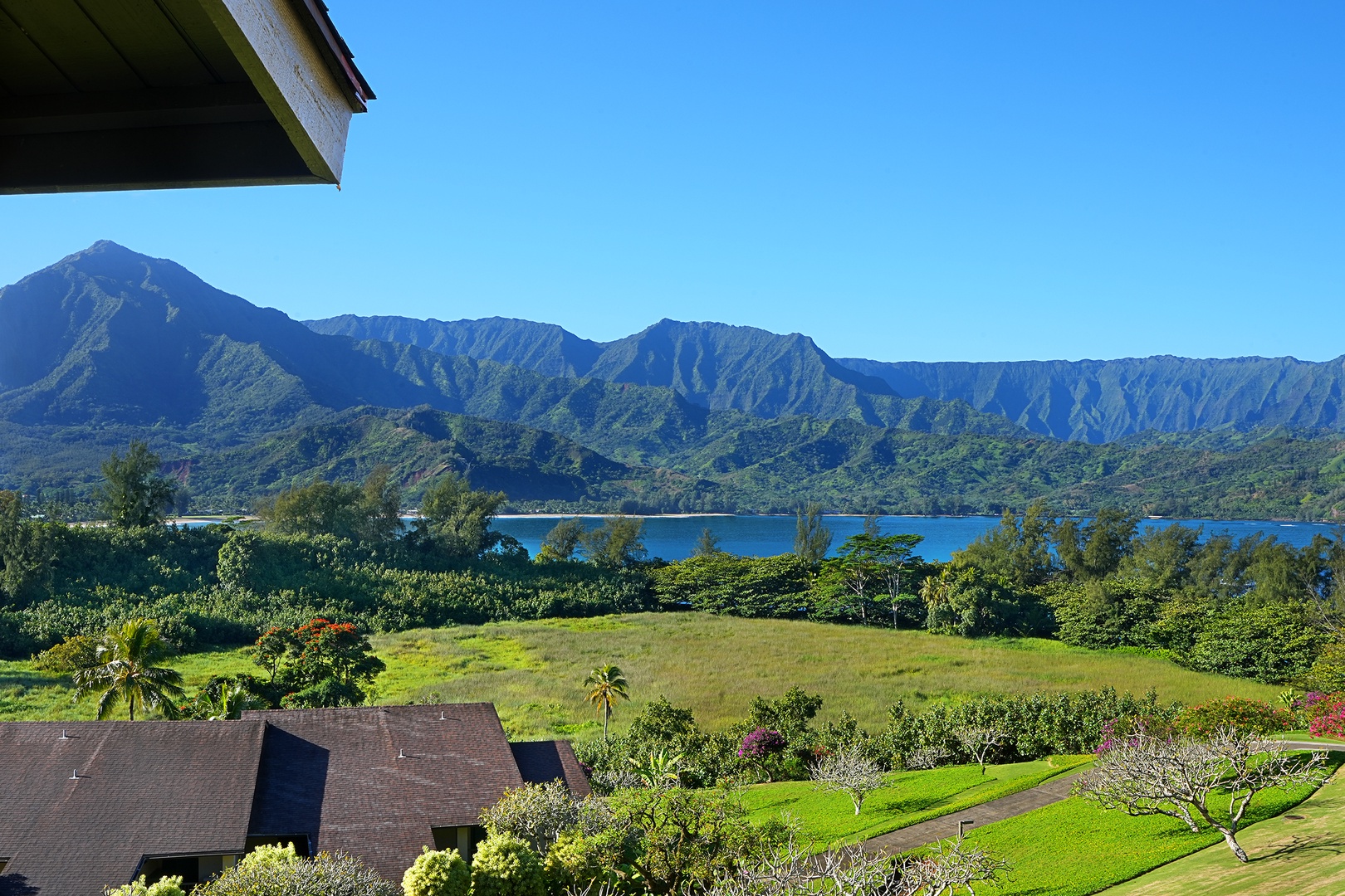 Princeville Vacation Rentals, Hanalei Bay Resort 4302/3 - View from Breathtaking view of Hanalei Bay and lush greenery from the lanai.