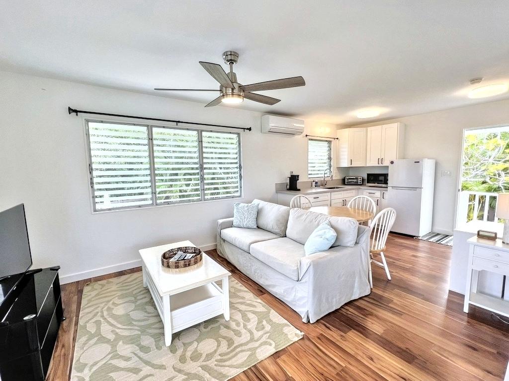 Kailua Vacation Rentals, Lanikai Cottage - Unwind in the guest cottage sitting area, featuring cozy furnishings and new split air conditioning.