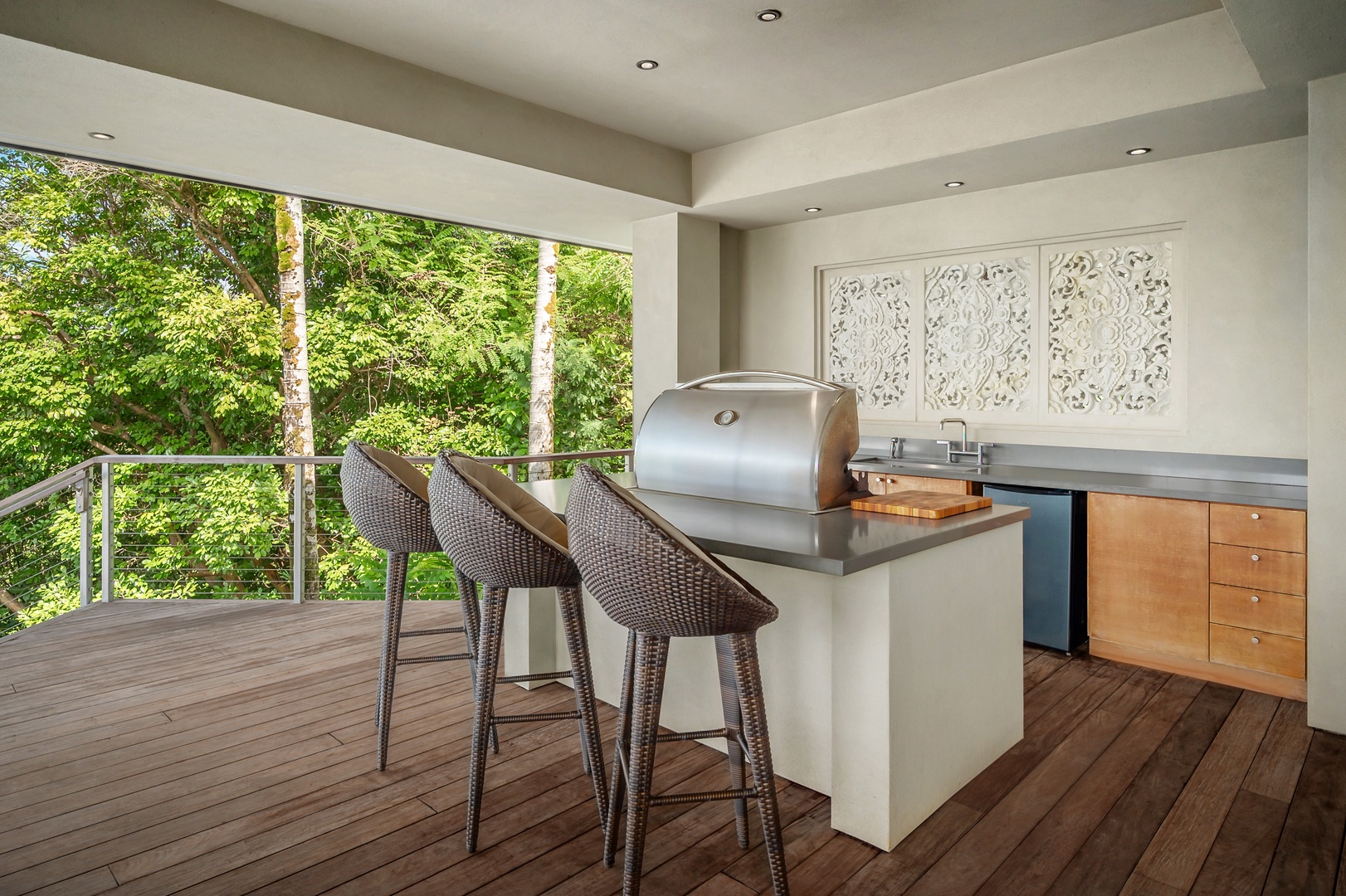 Princeville Vacation Rentals, Hanalei Plantation Villa - Outdoor BBQ area with bar seating, perfect for grilling and gathering with friends and family.