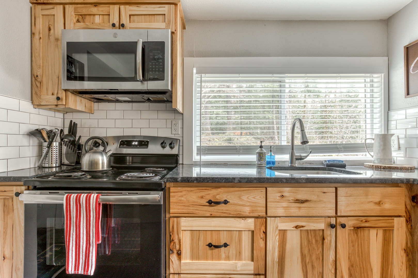 Rhododendron Vacation Rentals, Riverbend Cabin #2 - Forest view from the kitchen sink!
