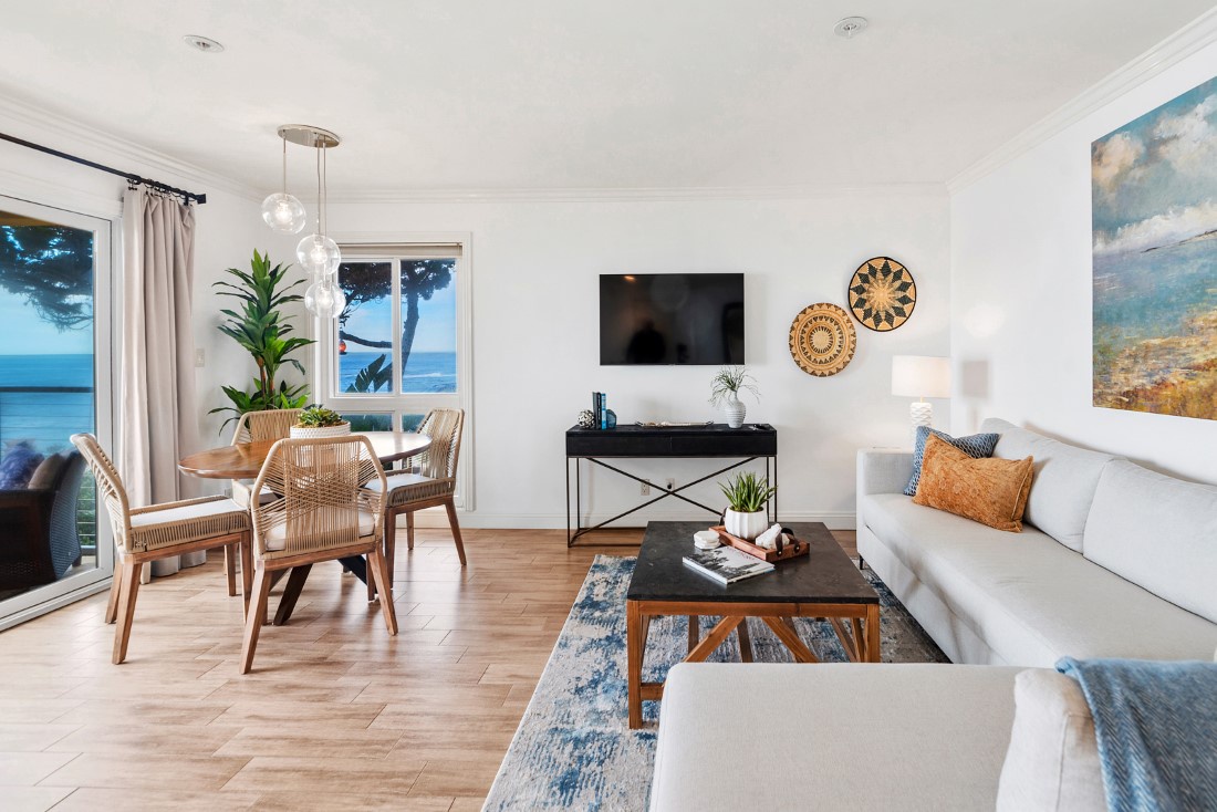 La Jolla Vacation Rentals, Oceanfront La Jolla Cove Condo - The plush sectional sofa is the perfect place to relax and enjoy the breathtaking West Coast sunsets that will grace the coastline nightly.