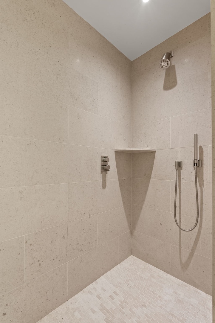 Honolulu Vacation Rentals, Park Lane Getaway - Minimalist shower with a calming, spa-like atmosphere.