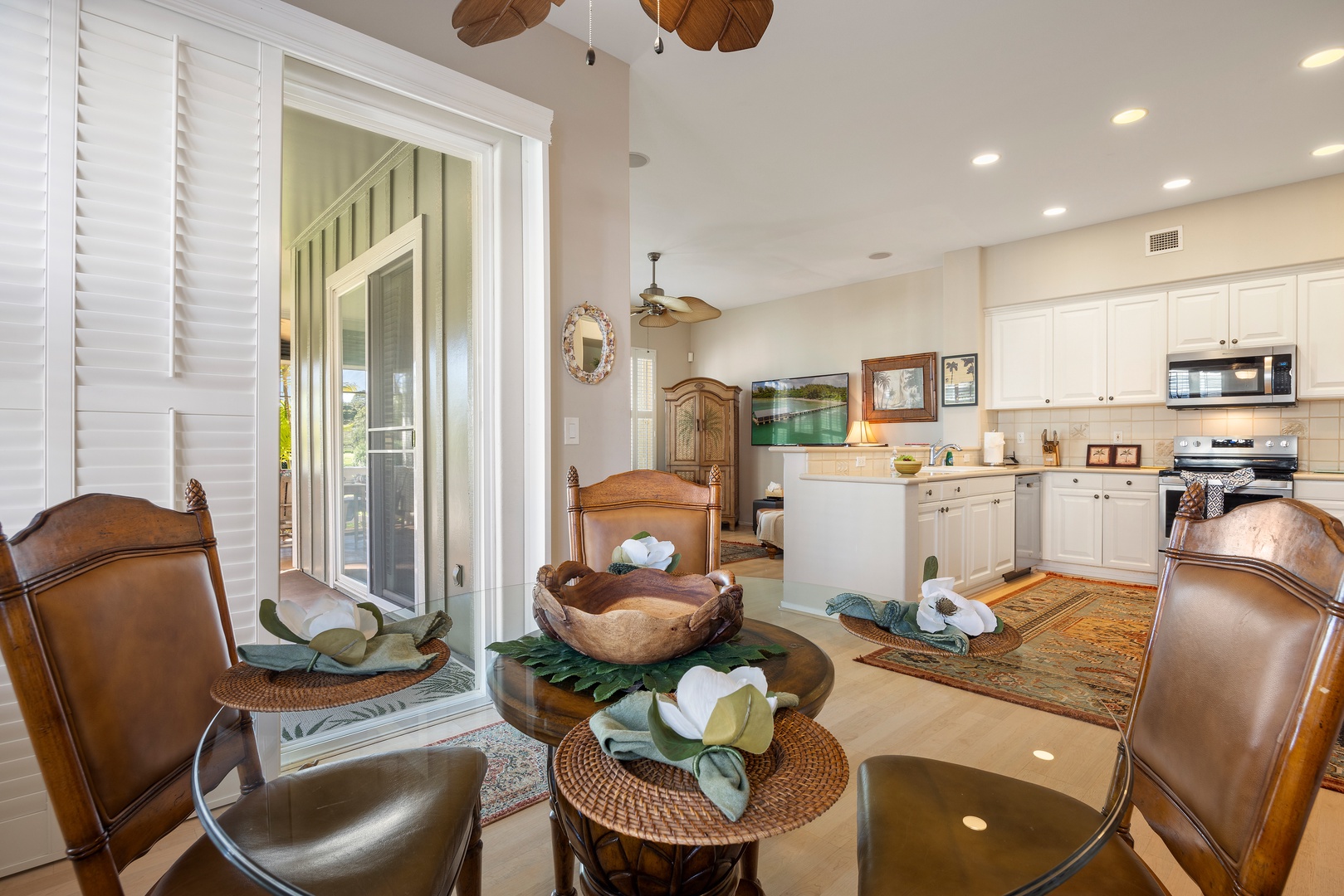 Settle into your stylish open-plan living space with rich leather seating, natural textures, and a fully equipped kitchen ready for your culinary adventures.