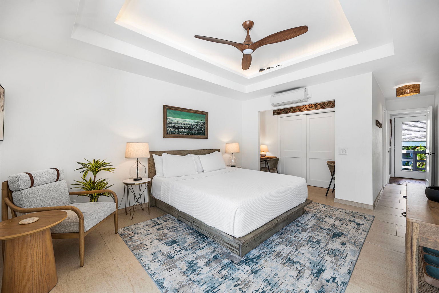 Kailua Kona Vacation Rentals, Manukai Hale - The primary bedroom keeps its ceiling fan turning and the light soft and low.