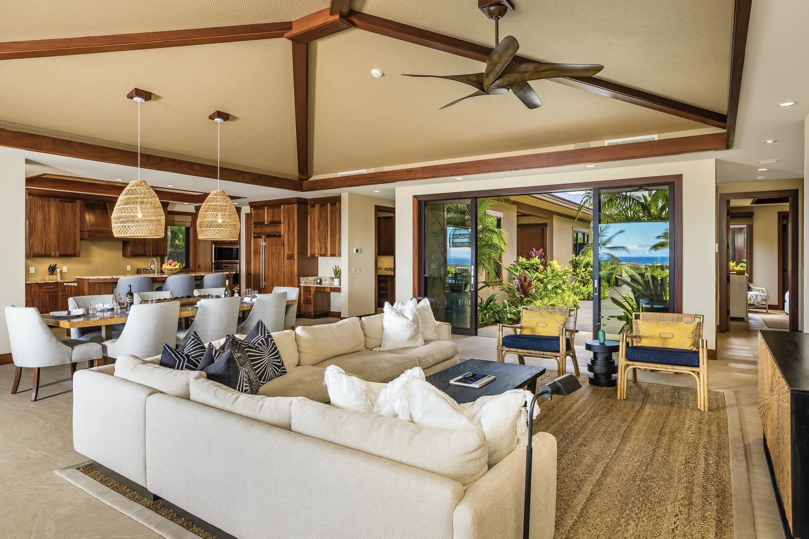 Kailua Kona Vacation Rentals, 4BD Kulanakauhale (3558) Estate Home at Four Seasons Resort at Hualalai - Reverse view of great room highlighting sliding glass pocket doors in front entryway.