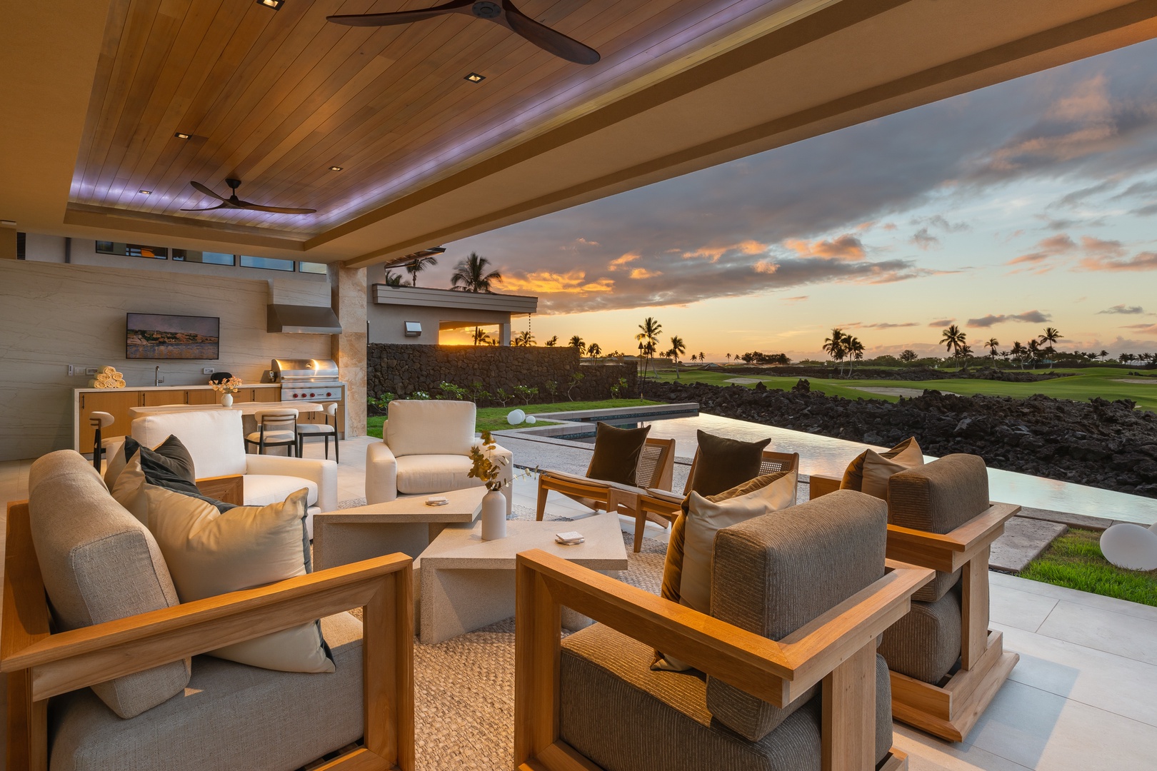 Kamuela Vacation Rentals, 6BD Mauna Lani Lux Golf Estate (3) at One Ocean - Lounge in the living area that opens to the expansive lanai with wall to wall sliders.